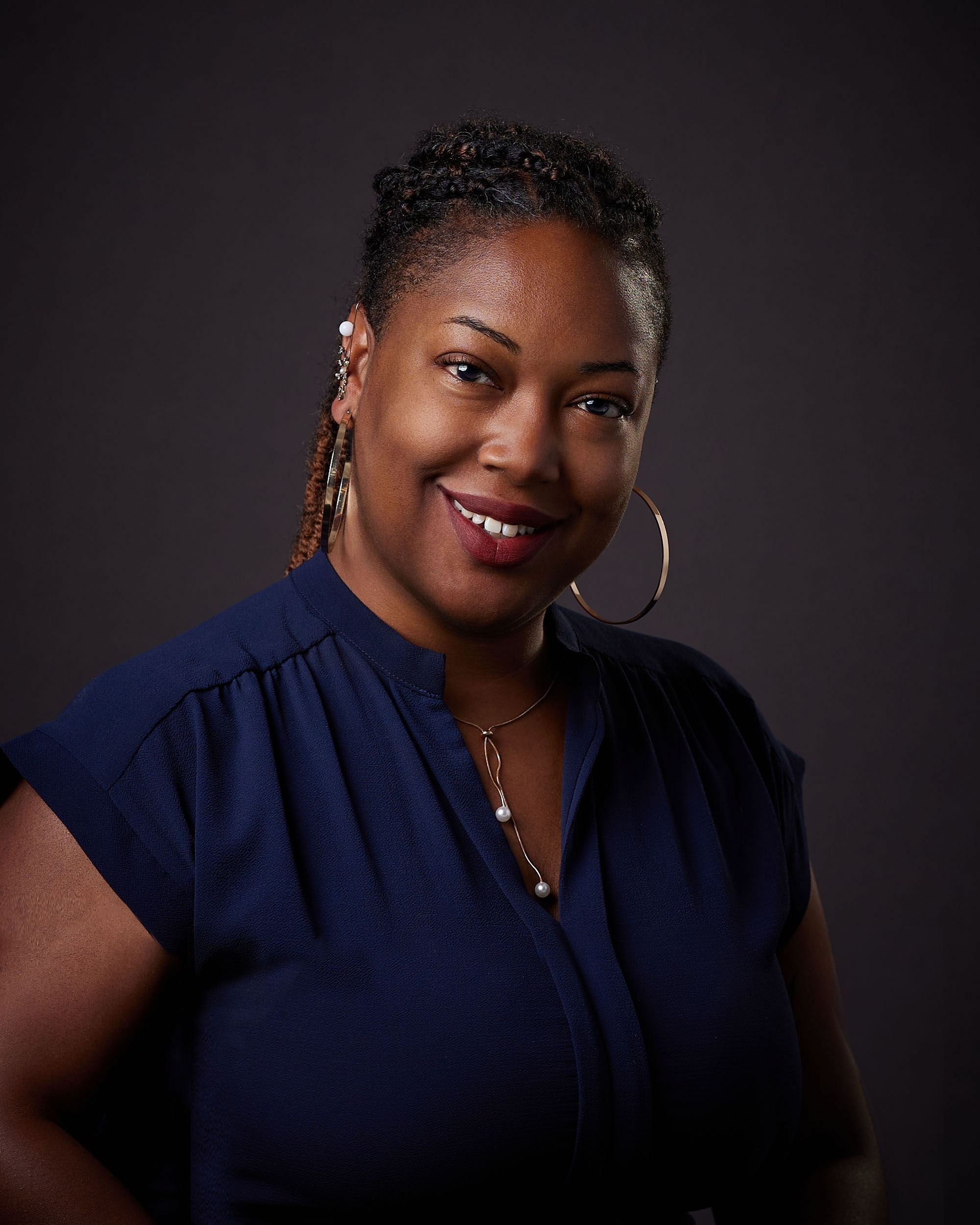 Smiling woman, official city portrait. 