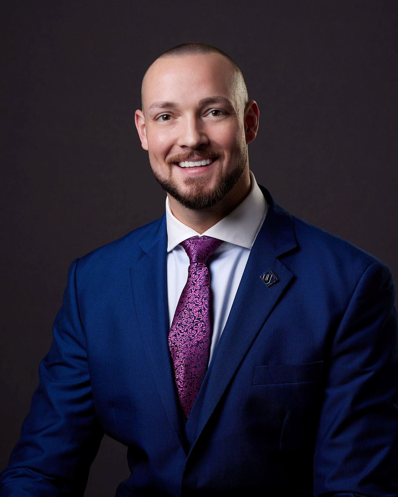 Picture of Derek Zarn standing and smiling 