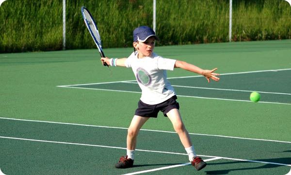 Boy Playing Tennis
