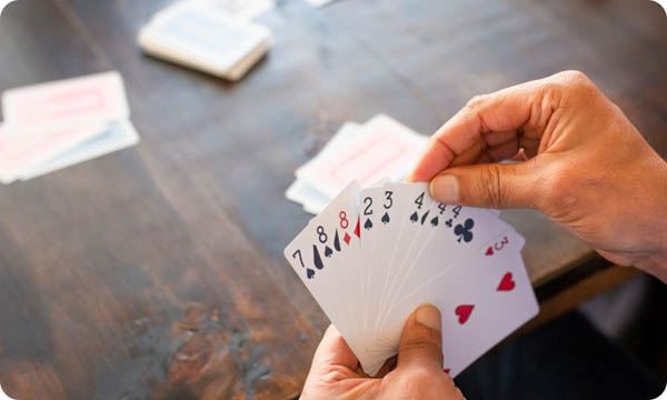 People Playing Card Game