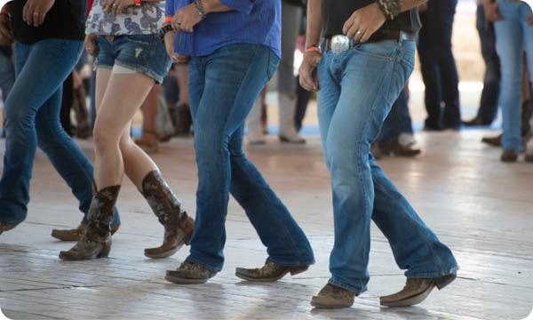 Men and Woman Line Dance in Country Club