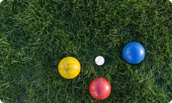 Bocce Balls in Green Grass