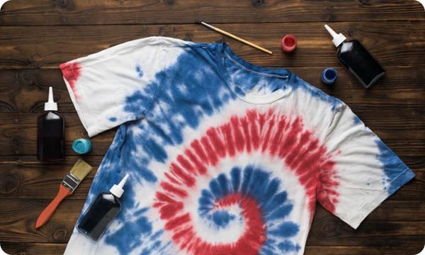 A White T-Shirt Painted in Red and Blue Tie Dye Style