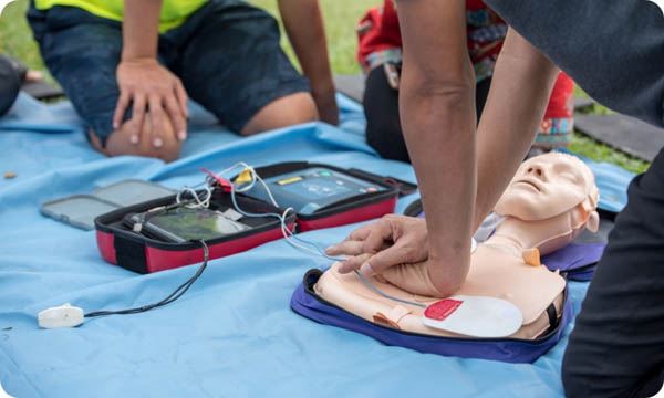 CPR Training Chest Compression on Training Manikin 