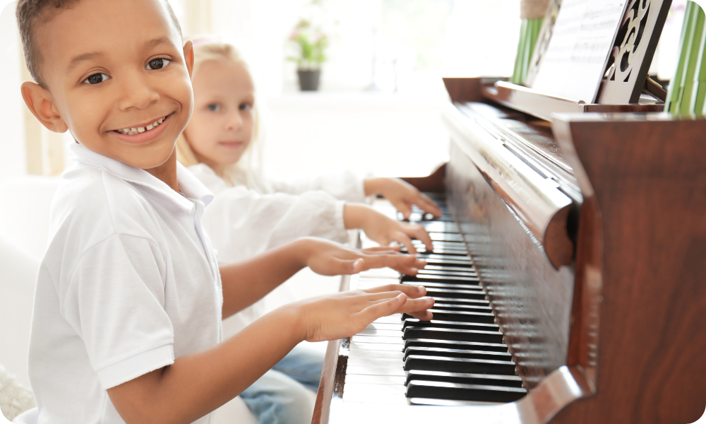 Young child playing piano