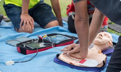 Students learning CPR